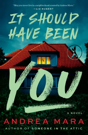 Book cover of 'It Should Have Been You' by Andrea Mara with a lit window house at night and large title text.